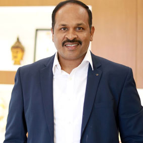 T Babu, Chairman 